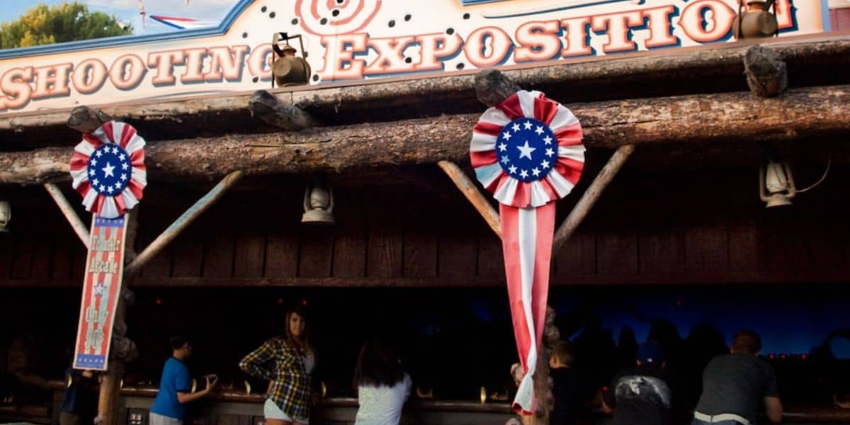 Guests at the Frontierland Shootin' Exposition at Disneyland Park
