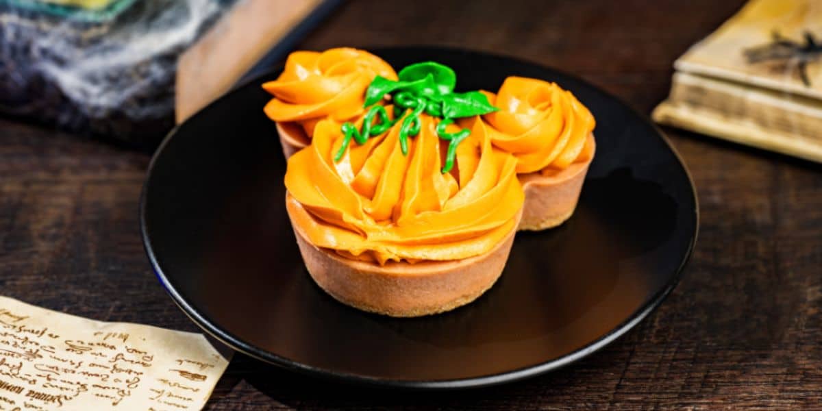 mickey mouse pumpkin cheesecake treat for halloween season at disney world