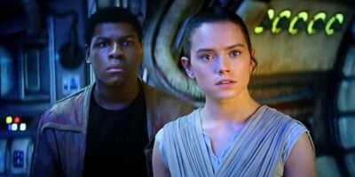 L to R: Finn and Rey looking shocked in 'The Force Awakens'