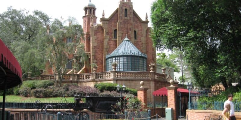 The Haunted Mansion and its hearse at Magic Kingdom
