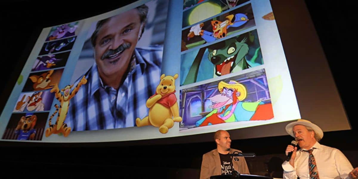 Jim Cummings on the stage at a Disney event