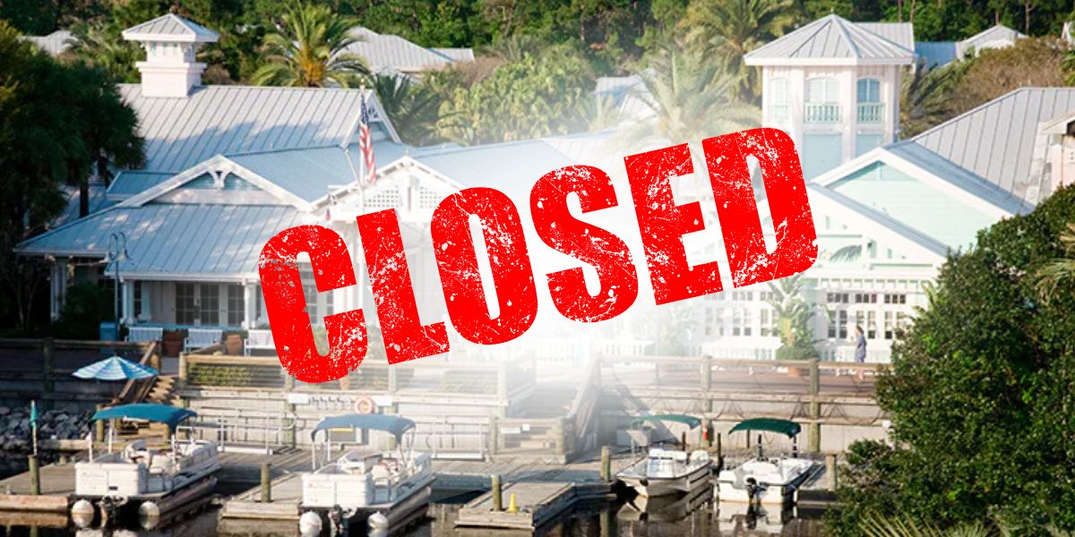 The iconic waterfront restaurant at Disney World Resort, with boats lined up outside, sits beneath a bold red “CLOSED” stamp—signaling the end of a favorite dining experience for Disney fans.
