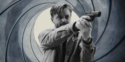 Mixed image: Background - James Bond barrel logo from 'No Time to Die', foreground - Jack Lowden pointing a gun in 'Slow Horses'
