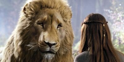 Aslan the lion greets a young girl