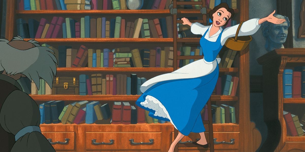 Belle from Beauty and the Beast, wearing her signature blue dress, stands on a library ladder in the Beast’s enchanted castle, reaching for colorful books on towering shelves.