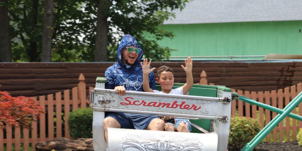 Guests on the Scrambler ride.