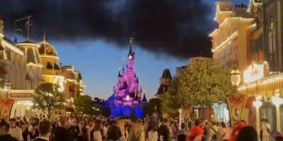 Smoke from a fire rises above Disneyland Park's Sleeping Beauty Castle in Paris