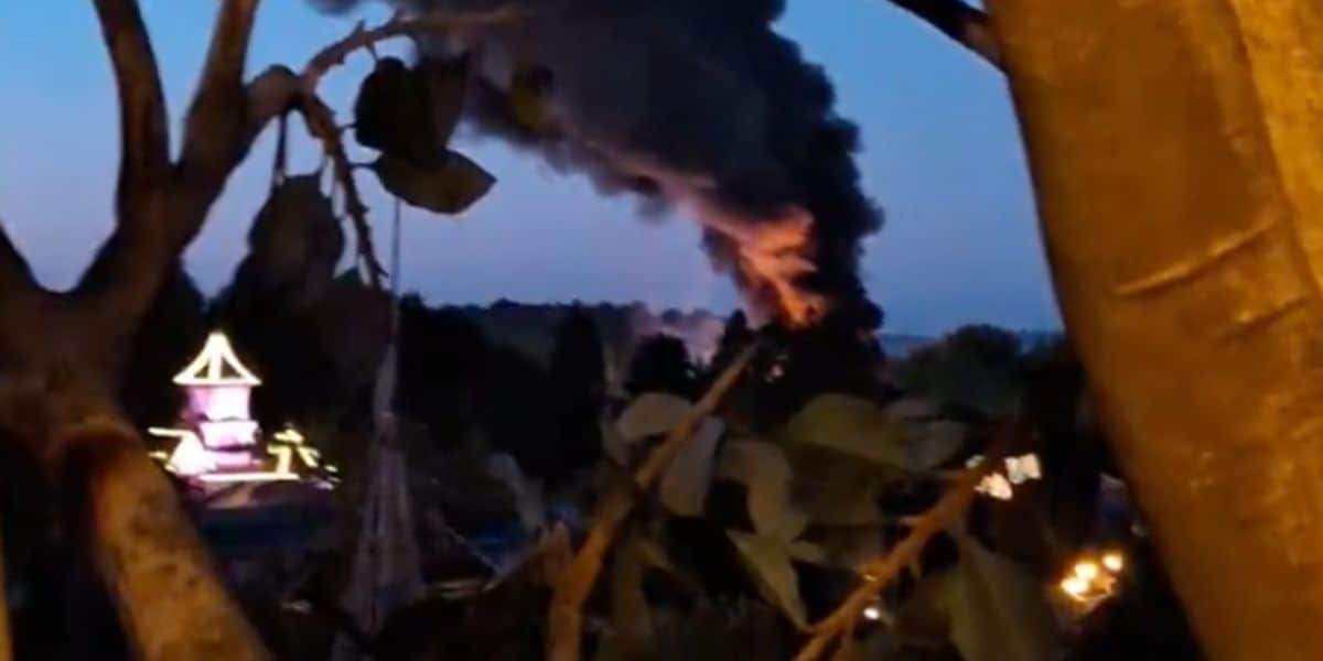Smoke billowing from a fire behind Disneyland Paris Resort