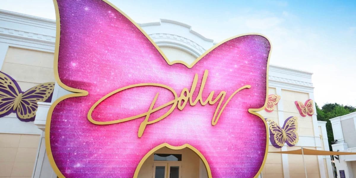iconic pink butterfly Dolly sign in Dollywood