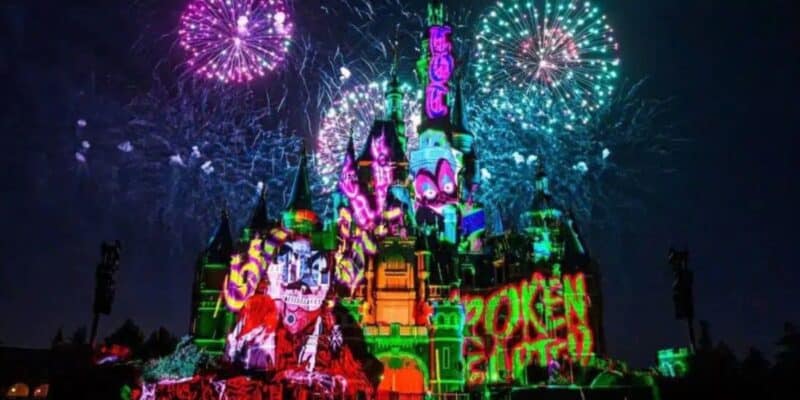 Disneyland Shanghai castle lit up with villains during halloween