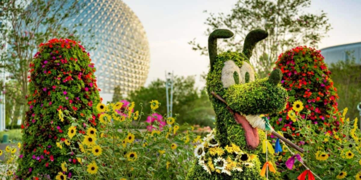 Pluto topiary in front of Spaceship Earth during EPCOT International Flower and Garden Festival