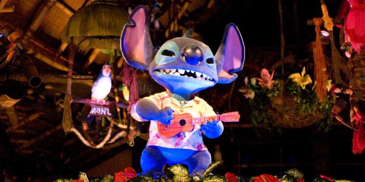 A Stitch animatronic playing guitar in Tokyo Disneyland's version of the Enchanted Tiki Room