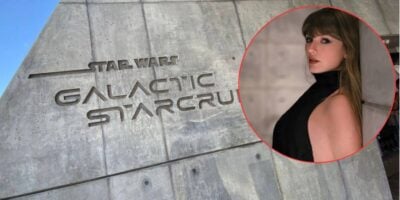 Rey from Star Wars appears inside a circular frame above the Star Wars: Galactic Starcruiser entrance sign, displayed on a concrete background.