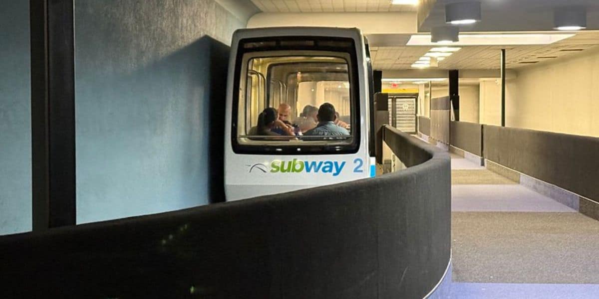 Tomorrowland Transit Authority PeopleMover car 2 in a Disney terminal tunnel.