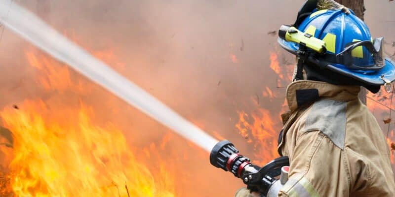 Fire and smoke surrounding a water slide at CaliBunga Waterpark in San Jose during the October 3, 2026 fire.