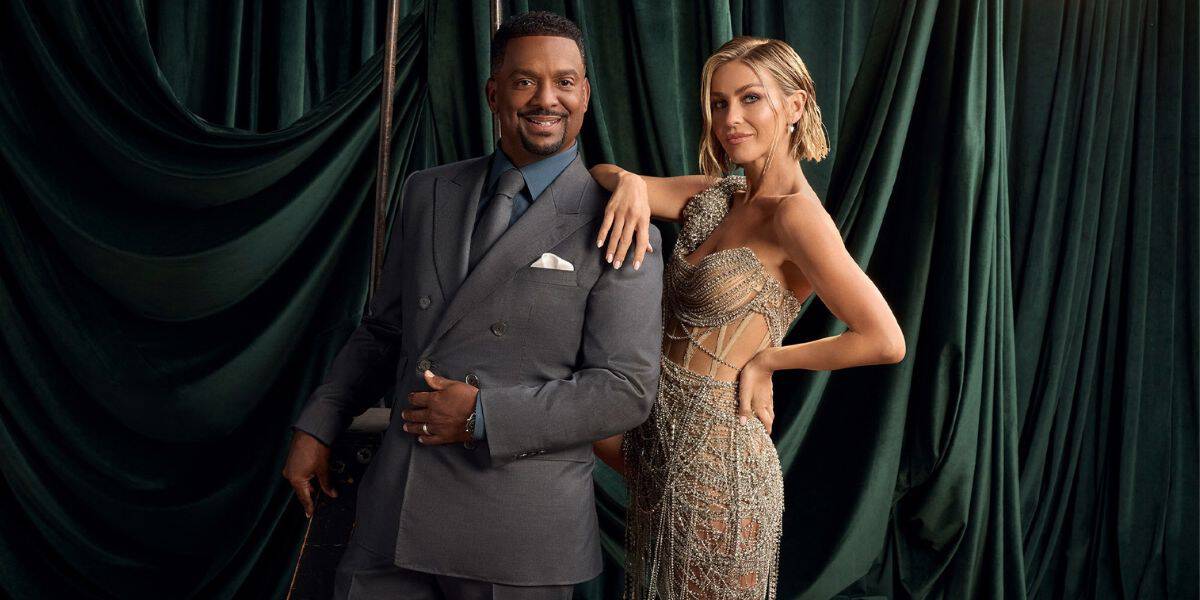 Alfonso Ribeiro and Julianne Hough posing in front of the Dancing with the Stars green screen.