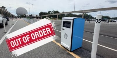 An Out of Order sign on a solar trash can at EPCOT.