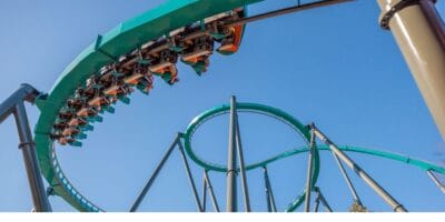 Goliath roller coaster with orange track and green supports at Six Flags Over Georgia.