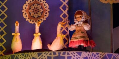 Three geese and a doll animatronic on "it's a small world" at Disneyland Park.
