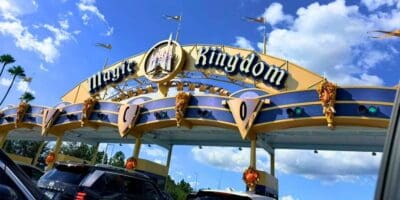 archway entrance to parking at disney world's magic kingdom park