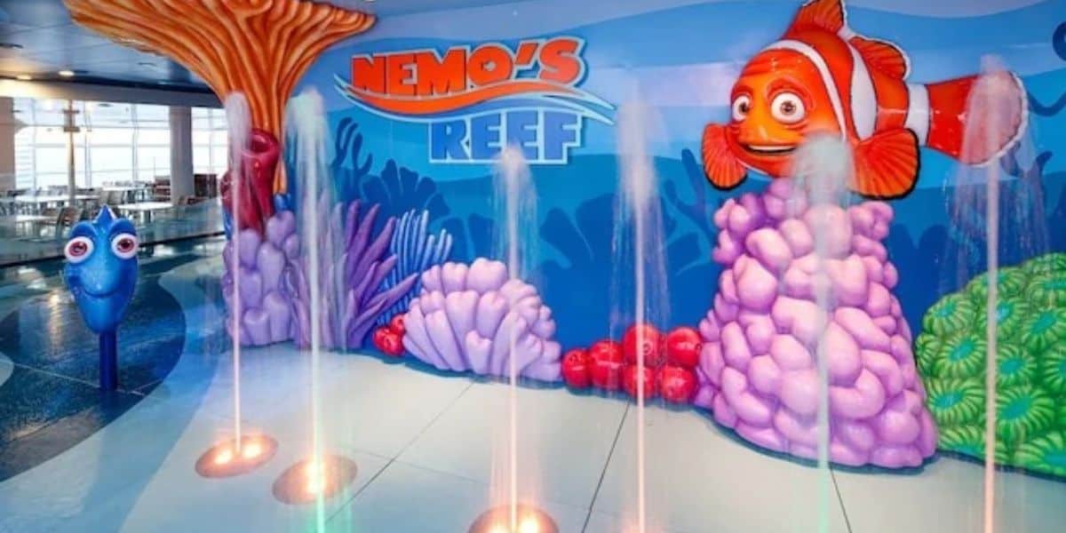Nemo’s Reef splash pad at Disney Cruise Line featuring Nemo and Dory decor.