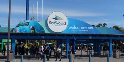 Guests arriving at the SeaWorld San Diego entrance gate.