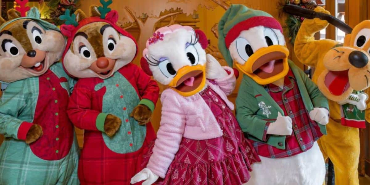 Chip, Dale, Daisy Duck, Donald Duck, and Pluto in holiday outfits at a Disneyland's Storyteller's Cafe
